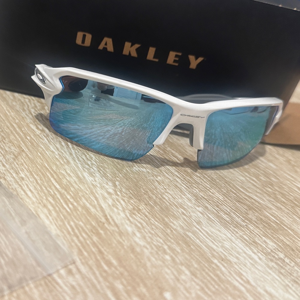 Oakley White Frame with Reflective Blue Lenses